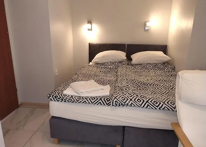 Bialy Przy Plazy ホームステイ ミエンジズドロイェ